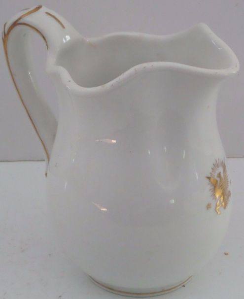 side view milk or cream pitcher dated 1897