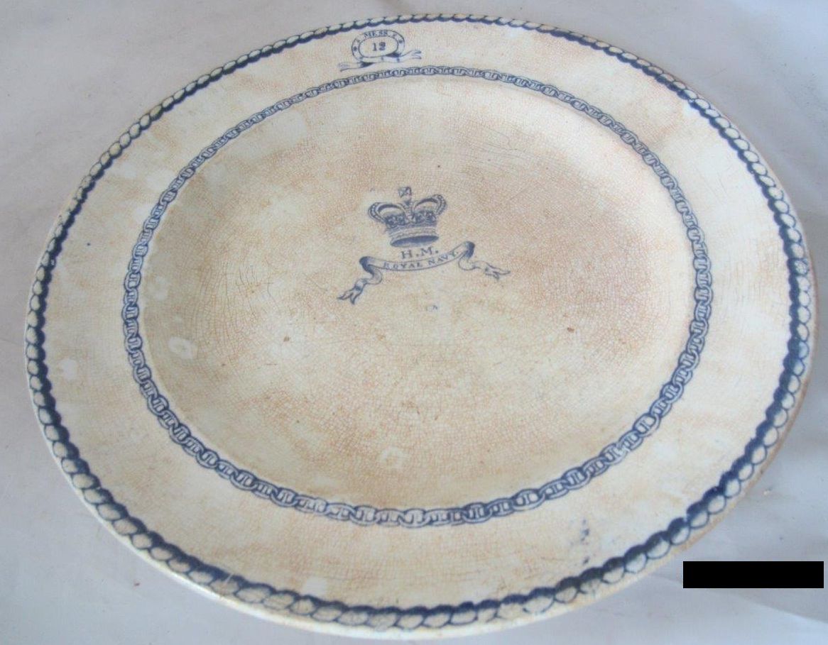 simple badge with mess 12 and nicely detailed centerpiece w/ royal crown and banner pre-1907