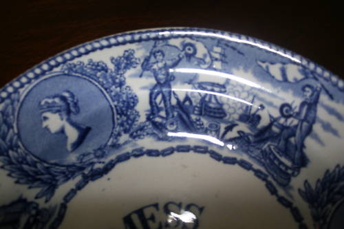 scene showing victoria and the naval scene of two sailors together