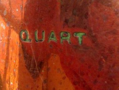 20th century style block text spelling out quart