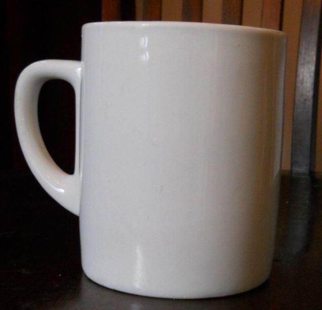 German Kriegsmarine tall white coffee cup dated 1941 by Jager Eisenberg