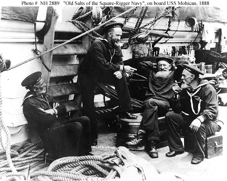 ca 1870s USS Mohican sailor John King sitting on his ditty box with Old Salts spinning tales and yarns