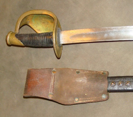 m1860 naval cutlass brass hilt and guard, leather scabbard and frog reverse