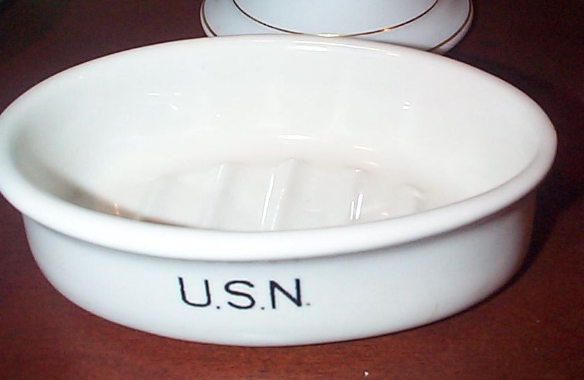 photo showing navy soap dishes stamped USN front