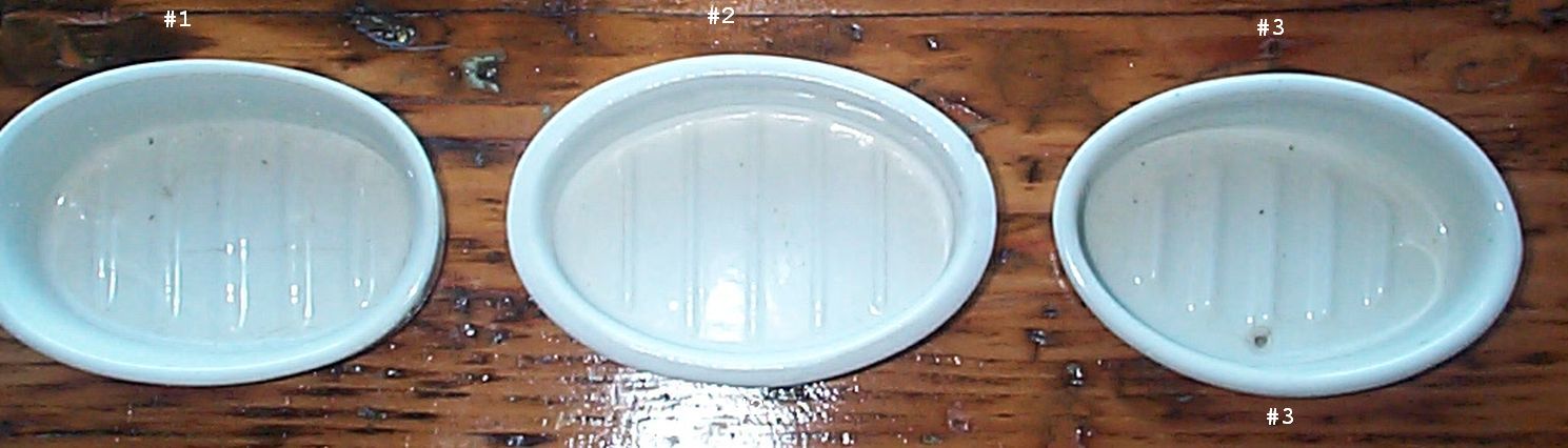 navy soap dishes stamped USN, bottom