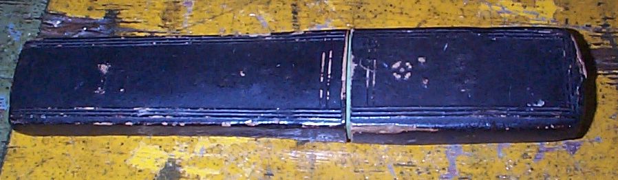 photo showing 19th century us navy straight razor stamped USN on the blade