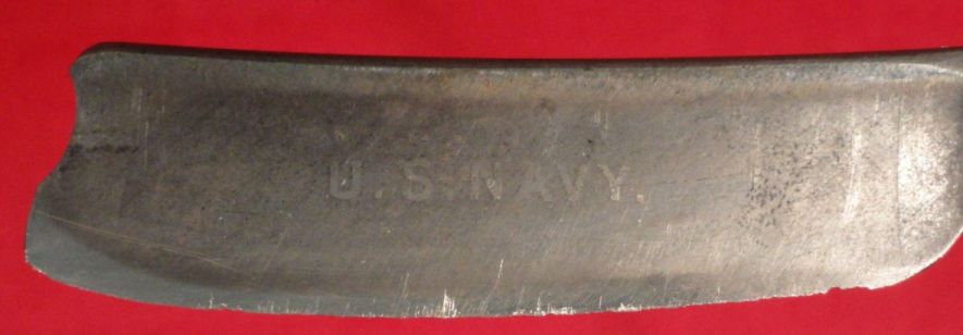 photo showing 19th century us navy straight razor stamped USN on the blade