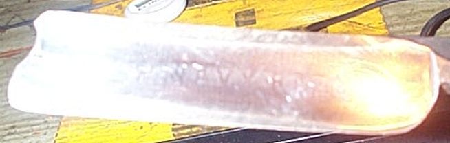 photo showing 19th century us navy straight razor stamped USN on the blade