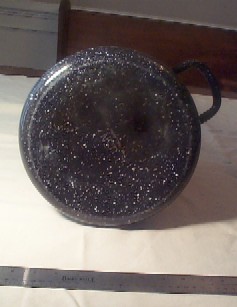 bottom view graniteware navy coffee pot showing stamped USN
