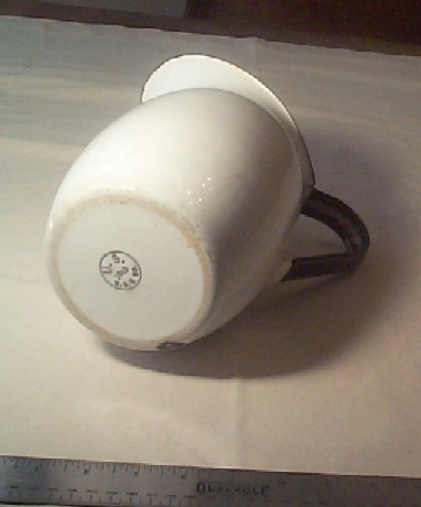 bottom view graniteware pitcher showing stamped MD USN